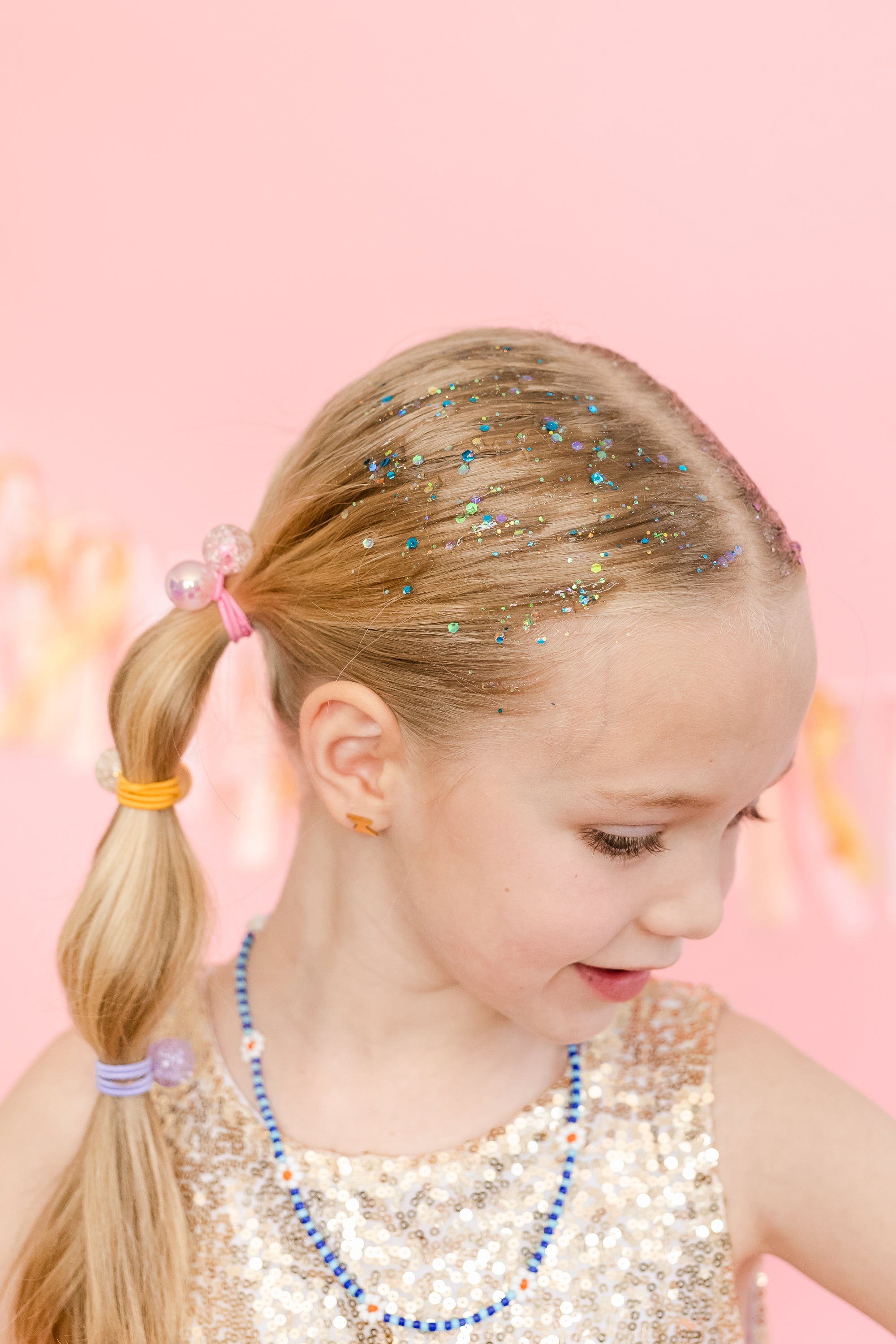 Blue hair glitter headband by Gussy Up Bow Co., featuring a sparkly, decorative accessory for hair styling.