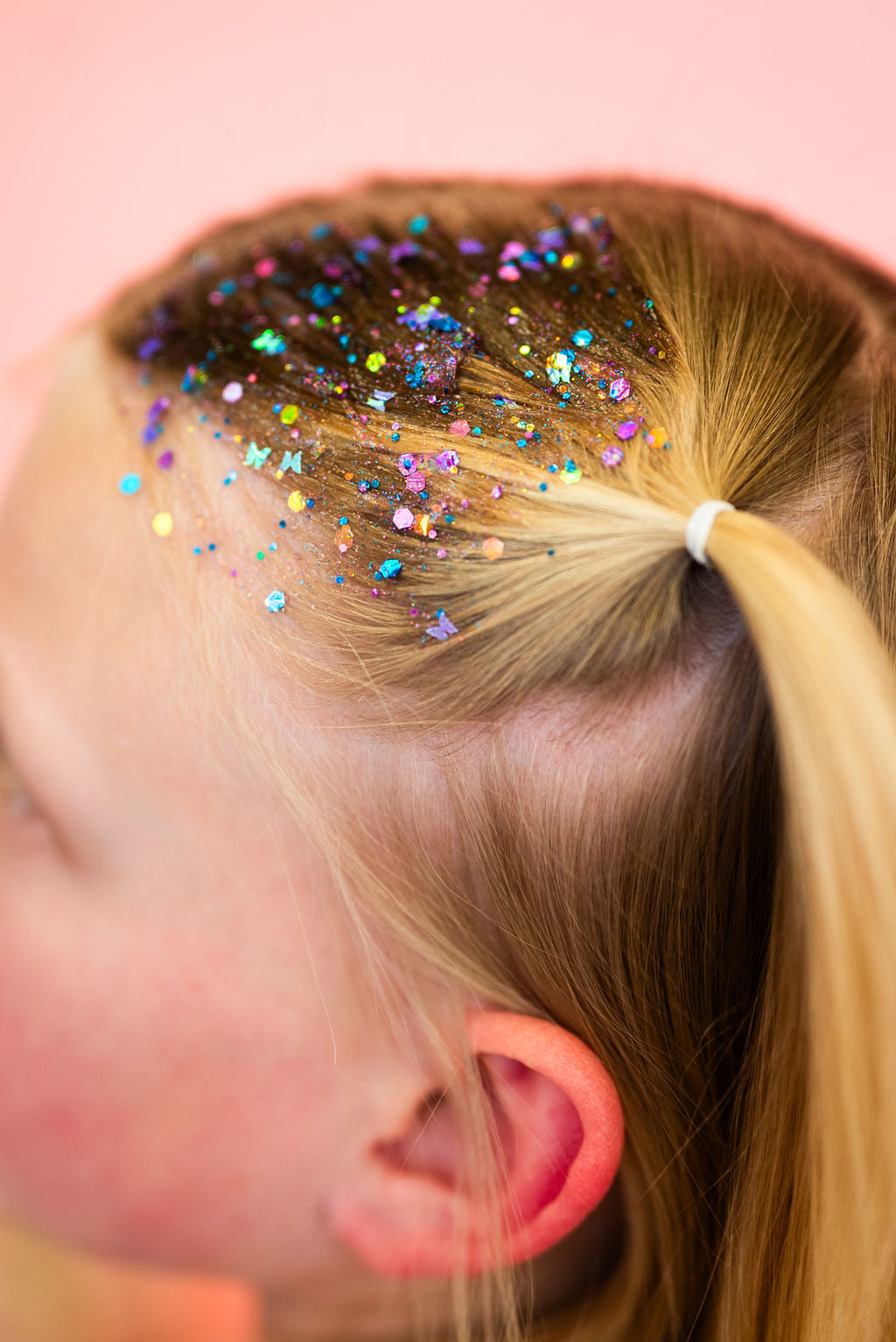 Pink butterfly hair glitter headband by Gussy Up Bow Co. with sparkling glitter accents and comfortable headband design.