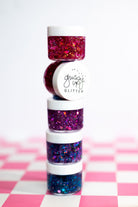 Butterfly Hair Glitter headband by Gussy Up Bow Co. featuring sparkling glitter and colorful butterfly accents.