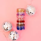 Gussy Up Bow Co. Eras Hair Glitter Stack headbands with sparkling glitter design for stylish hair accessories.
