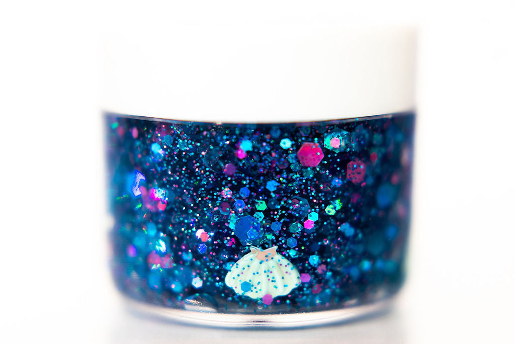 Gussy Up Bow Co. mermaid hair glitter headband with shimmering, colorful glitter accents for a whimsical, ocean-inspired look.