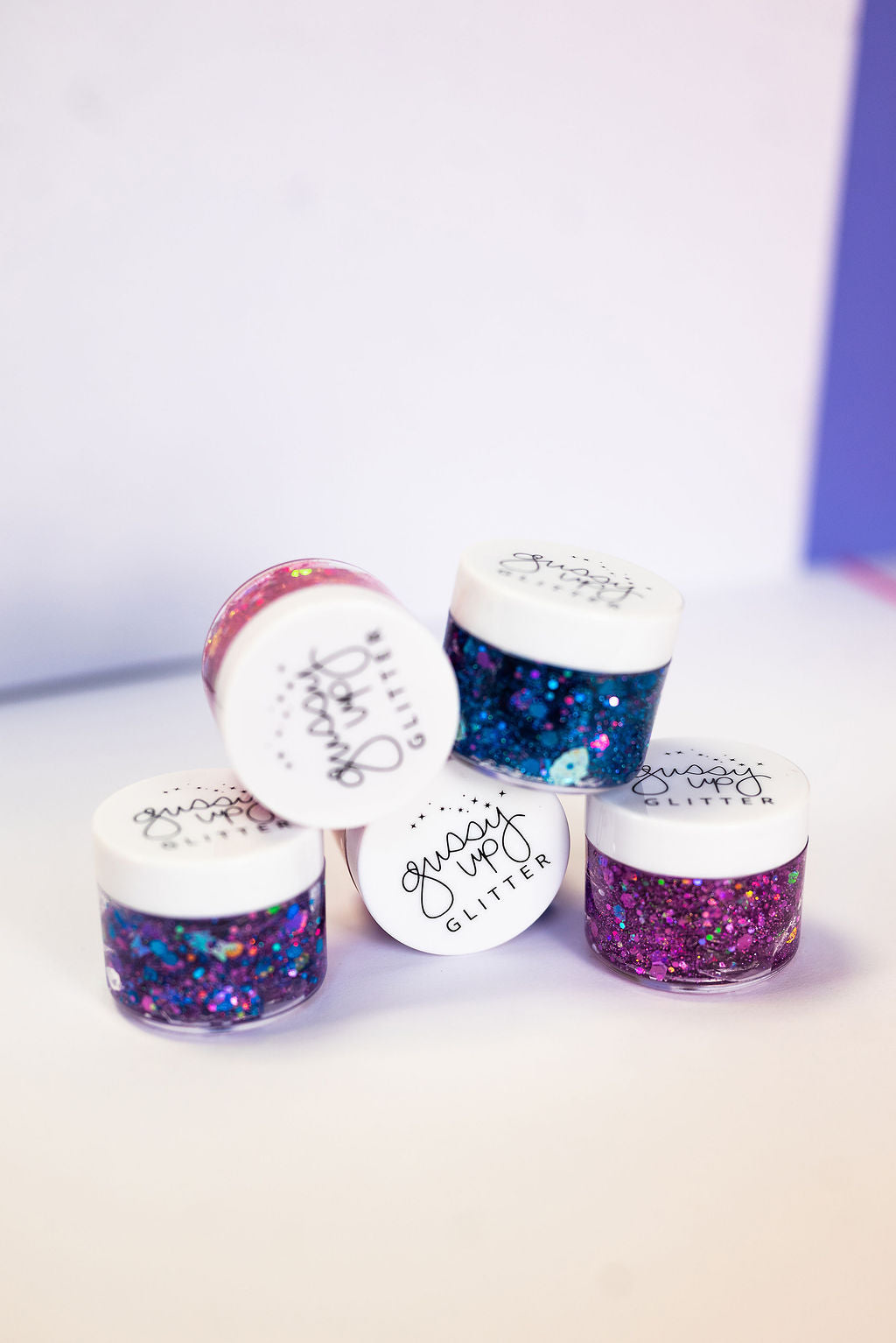 Gussy Up Bow Co. Mermaid Hair Glitter headband with shimmering glitter detail and flexible band for a stylish hair accessory.