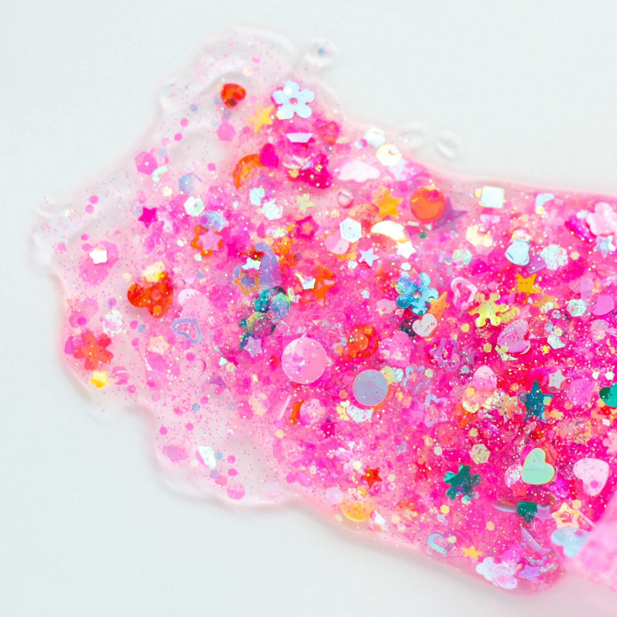 Multicolor hair glitter headbands by Gussy Up Bow Co. with sparkling, vibrant glitter accents on soft fabric bands.