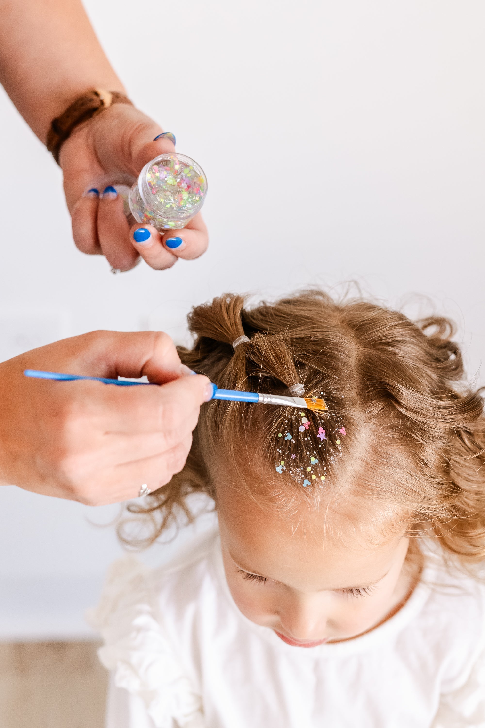 Gussy Up Bow Co. Pixie Dust Hair Glitter headband with sparkly glitter embellishments for a whimsical hairstyle accessory.