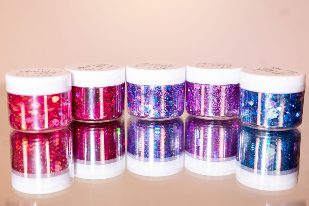 Purple hair glitter headband by Gussy Up Bow Co. featuring sparkly, vibrant glitter accents on a comfortable headband.