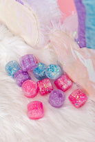 Purple hair glitter headband by Gussy Up Bow Co. featuring sparkling purple glitter and comfortable headband design.