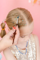 Purple hair glitter headband by Gussy Up Bow Co. featuring sparkling glitter and comfortable headband design.