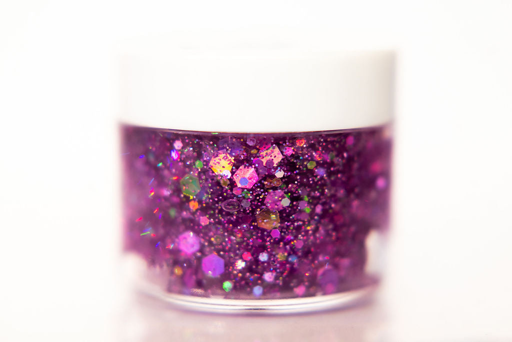 Purple hair glitter headband by Gussy Up Bow Co. featuring sparkling purple glitter on a stylish headband.