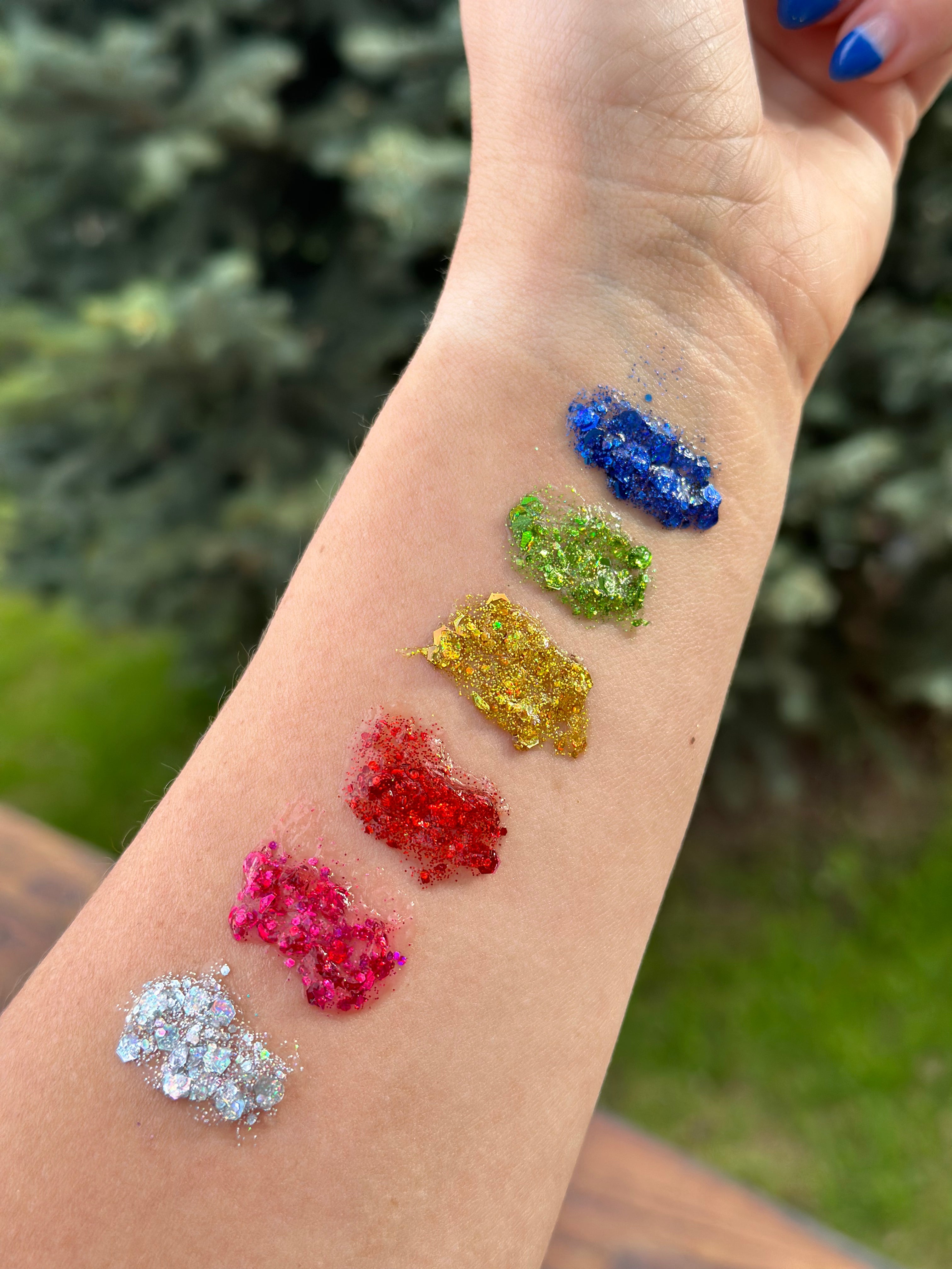 Rainbow Hair Glitter Stack headbands from Gussy Up Bow Co. featuring colorful glitter accents on a stylish headband.