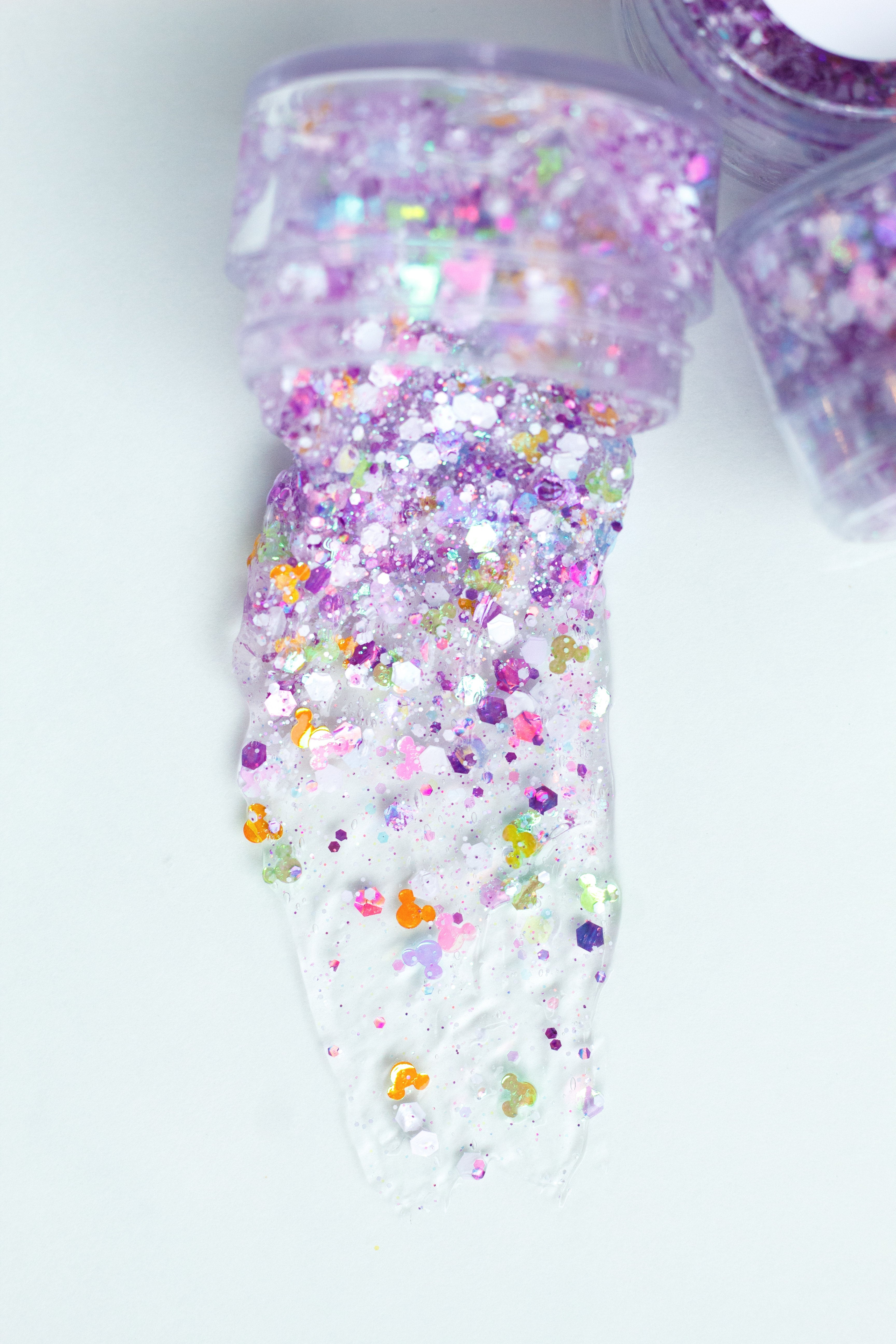 Spring Mouse Hair Glitter headband by Gussy Up Bow Co. featuring sparkly mouse hair embellishment and colorful design.