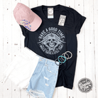 Gray V-neck graphic tee by The Graphic Tee with "Have a Good Time While There Is Still Time" design on the front.