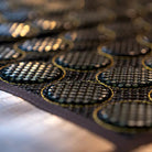 HealthyLine MESH Series Far Infrared Heating Pad, 72x24 inches, black heating mat with mesh design for therapeutic warmth.
