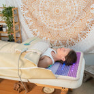 HealthyLine Rainbow Chakra 360 Wrap Set heating pad showing colorful chakra design, 74 x 28 inches, for soothing heat therapy.