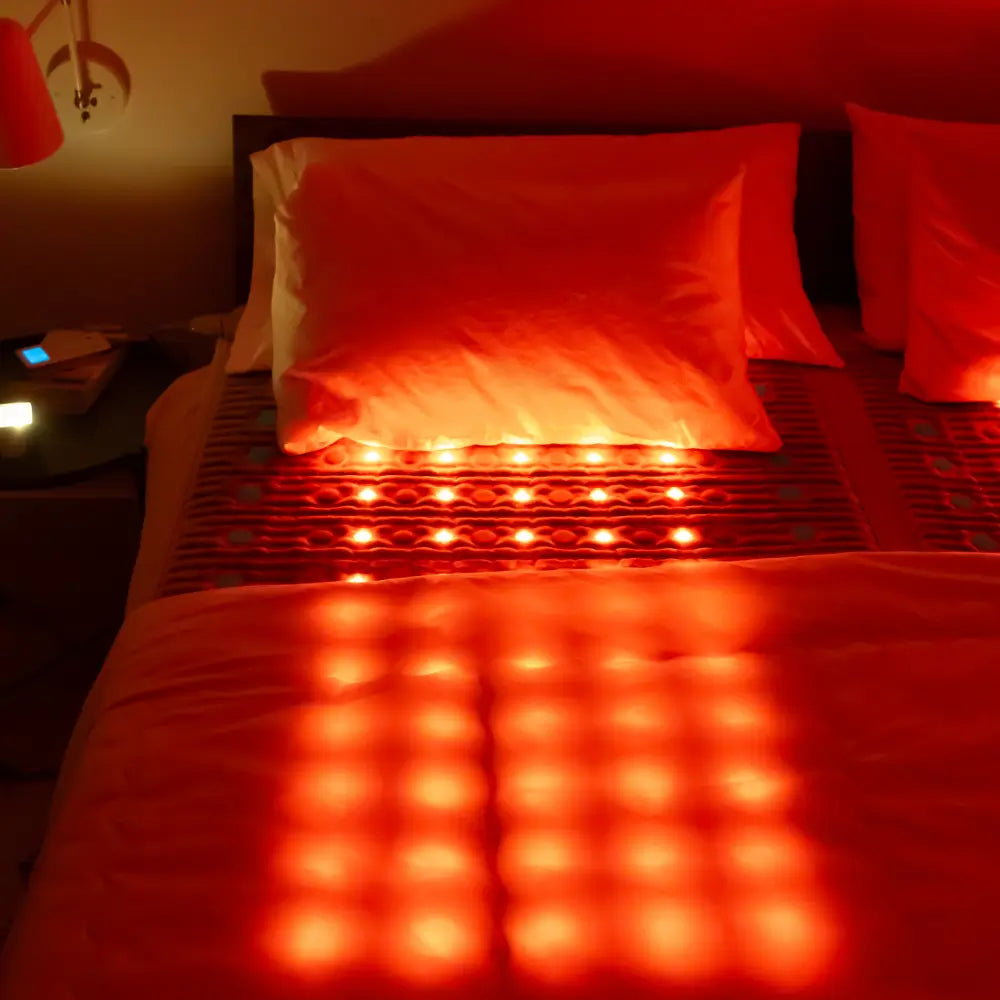 HealthyLine TAJ Bed Series heating pad on a mattress topper, 110V queen size, designed for soothing heat therapy.