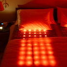 HealthyLine TAJ Bed Series heating pad on a mattress topper, 110V queen size, designed for soothing heat therapy.