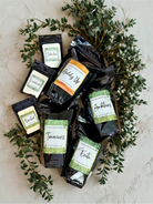 Heavenly Woods Candle Co HWCC Luxury Laundry Soap sample in a 2oz bottle with elegant packaging and sophisticated branding.