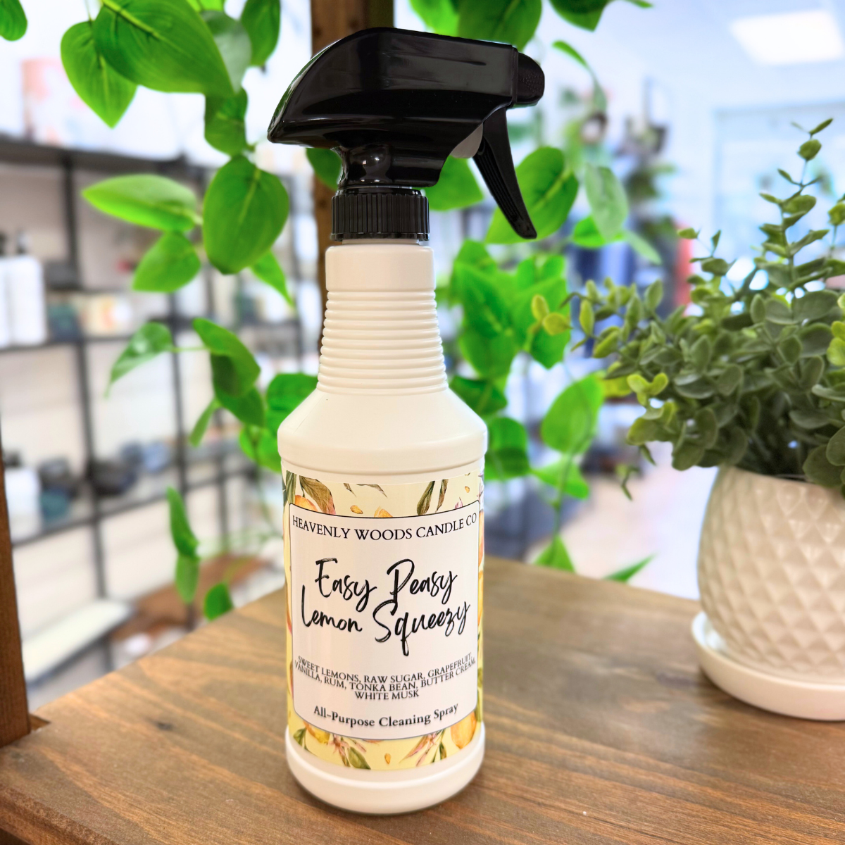 Heavenly Woods Candle Co Easy Peasy Lemon All-Purpose Cleaning Spray bottle with yellow lemon label and spray nozzle