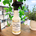 Heavenly Woods Candle Co Easy Peasy Lemon All-Purpose Cleaning Spray bottle with yellow lemon label and spray nozzle