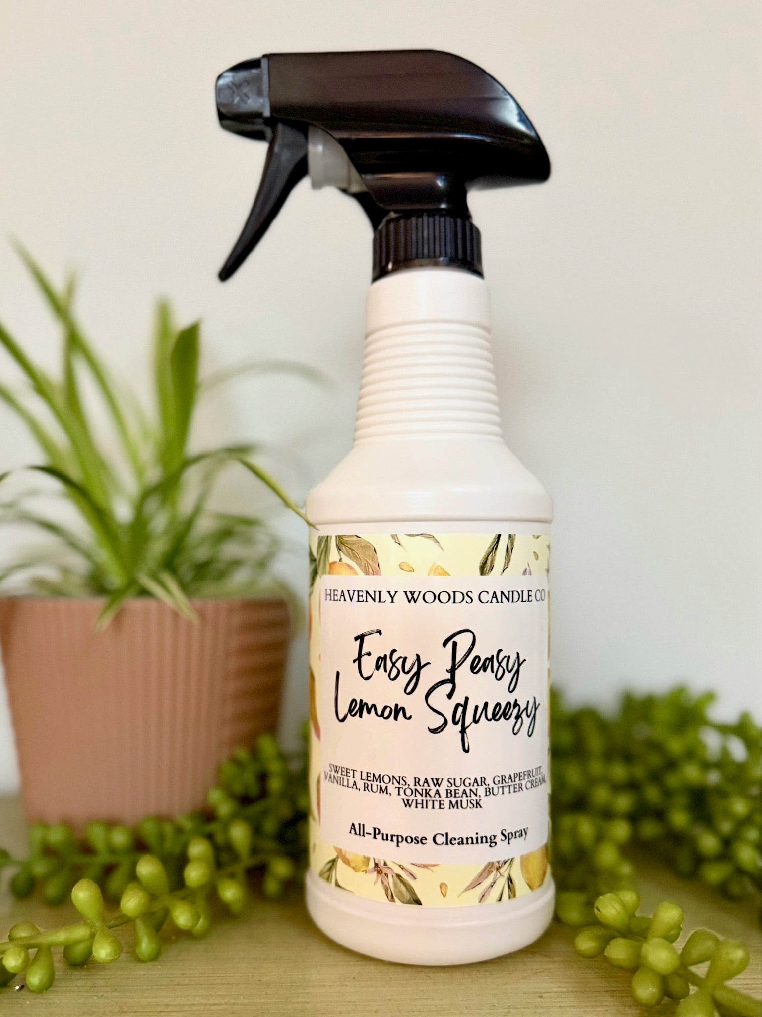 Easy Peasy Lemon all-purpose cleaning spray by Heavenly Woods Candle Co, showing a spray bottle with lemon scent label.