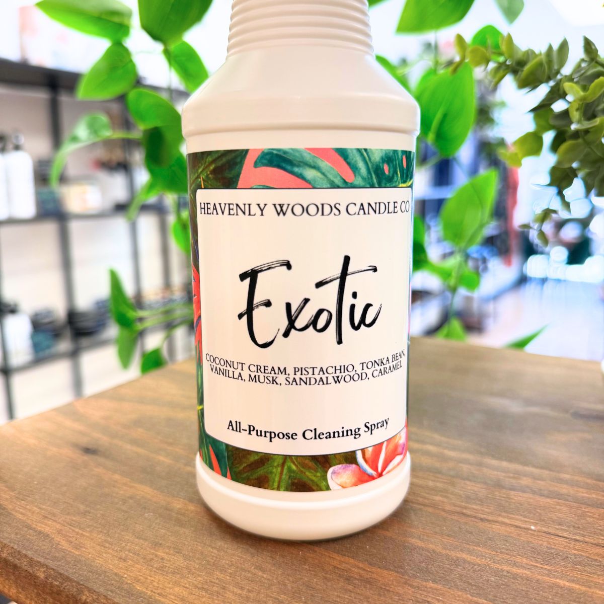 Exotic All-Purpose Cleaning Spray by Heavenly Woods Candle Co, showing a spray bottle with a natural, aromatic label design.