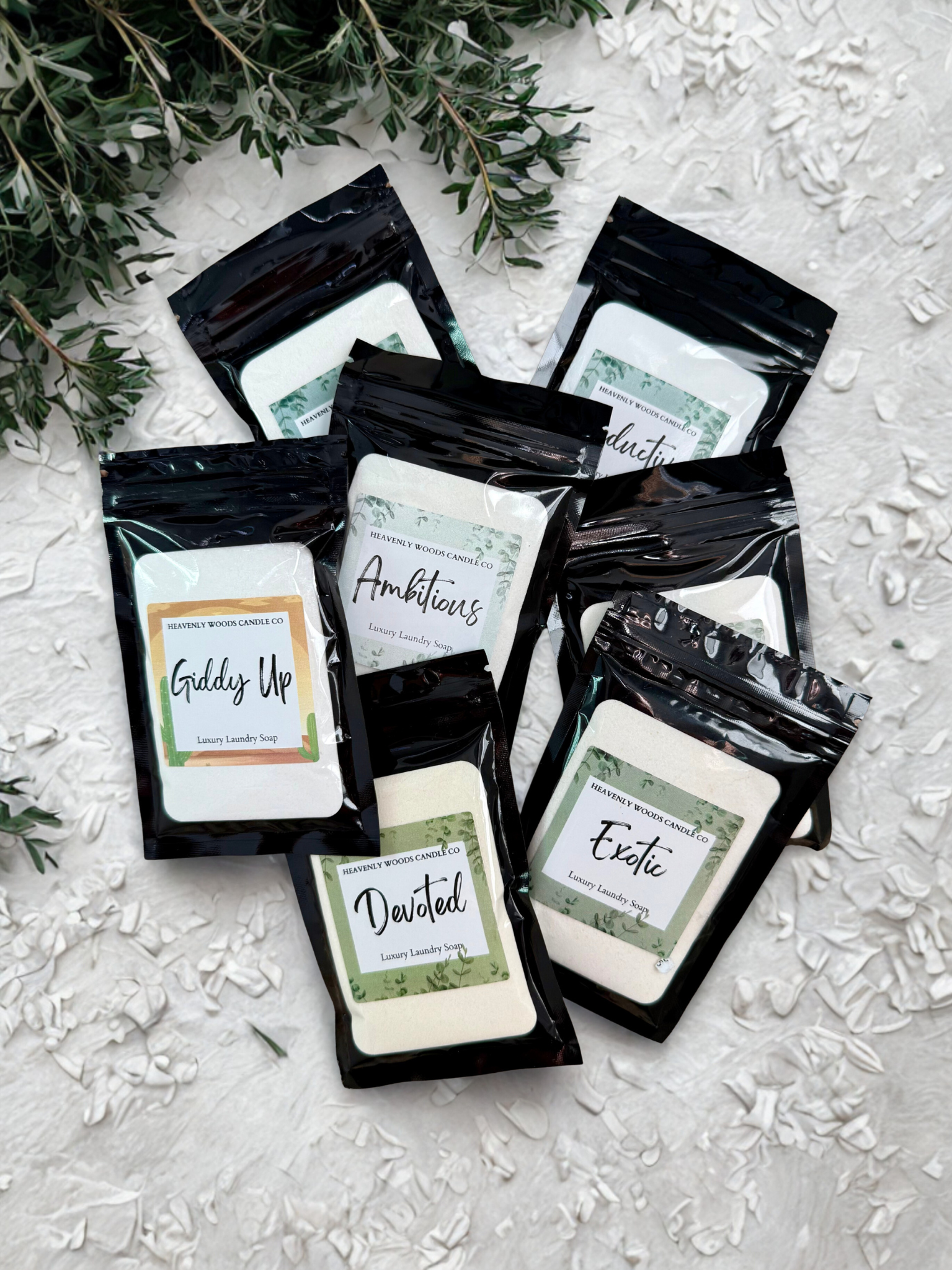 Heavenly Woods Candle Co HWCC Laundry Soap Discovery Pack with natural cleaning ingredients and eco-friendly packaging.