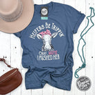 Heifers Be Trippin' slate short sleeve graphic tee by The Graphic Tee, featuring bold printed design on lightweight cotton shirt