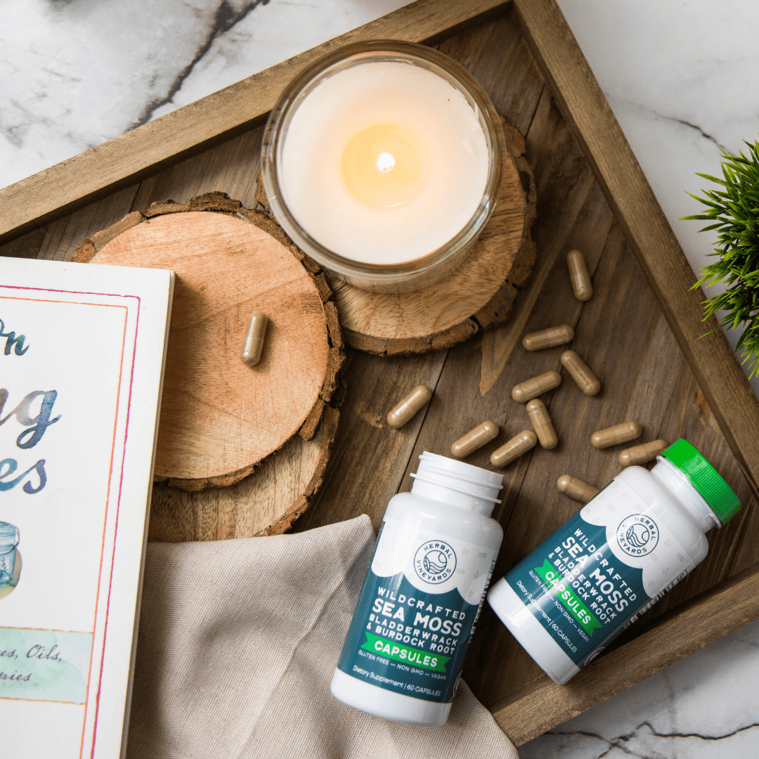 Organic sea moss, bladderwrack, and burdock root capsules in a clear bottle, labeled as Herbal Vineyards SEA MOSS CAPSULES.