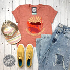 Here Comes The Sun graphic short sleeve tee by The Graphic Tee featuring a cheerful sun design on soft fabric.