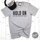Unisex graphic T-shirt with "Hold On Let Me Overthink This" text, casual style by The Graphic Tee, shown on a plain background.