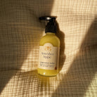 Honeybee Hippie Magnesium Butter jar with natural ingredients, smooth texture, and label visible on the container.
