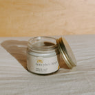 Honeybee Hippie Miracle Mud jar with natural clay and herbal ingredients for skincare benefits.