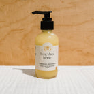 Honeybee Hippie California Sunshine Tallow Body Oil in a bottle, showcasing the natural tallow oil for skin nourishment.