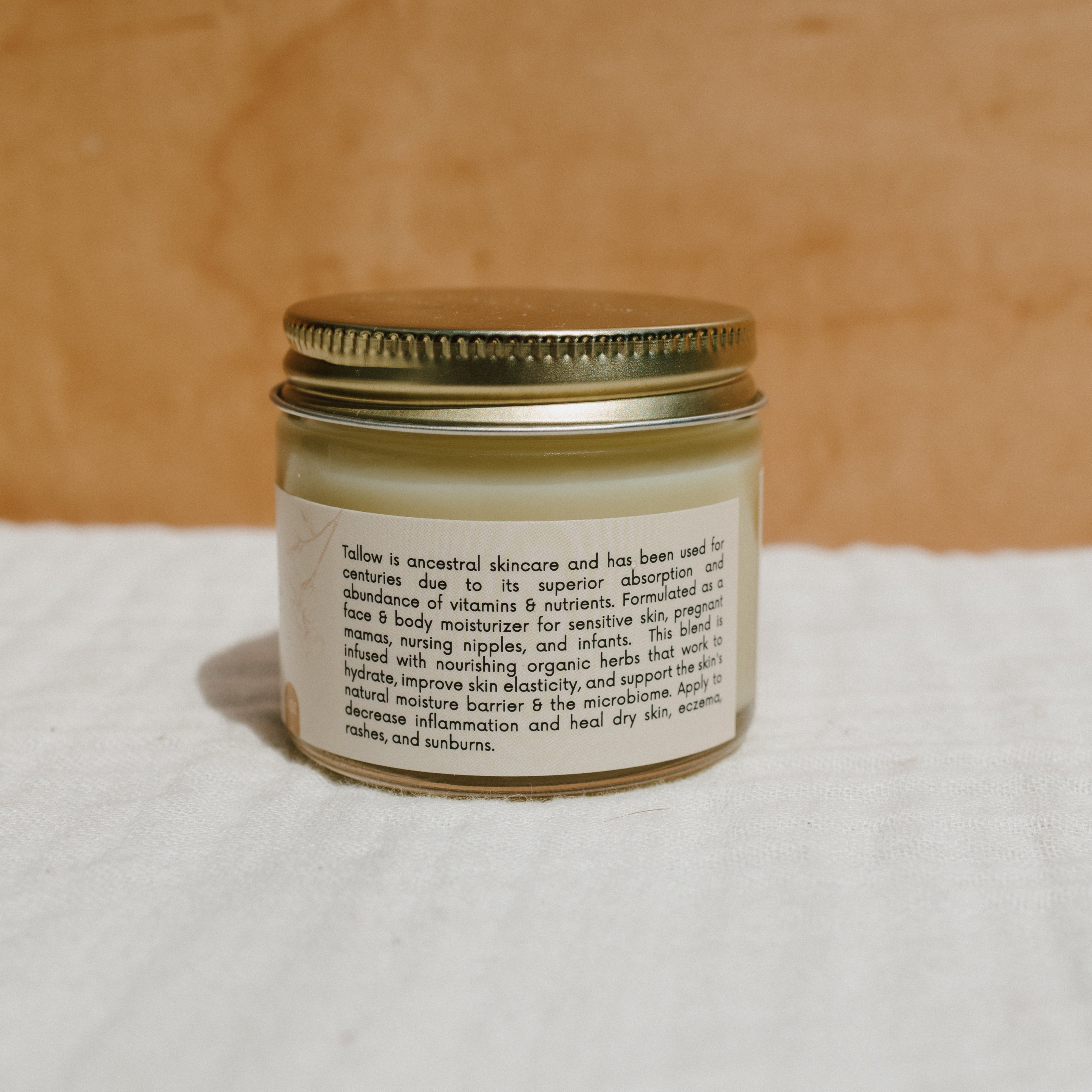 Natural Mama Tallow Butter in Honeybee Hippie Tallow Whip jar, creamy and smooth, made for nourishing skin care.