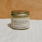 Natural Mama Tallow Butter in Honeybee Hippie Tallow Whip container, showcasing creamy, handcrafted skincare product.