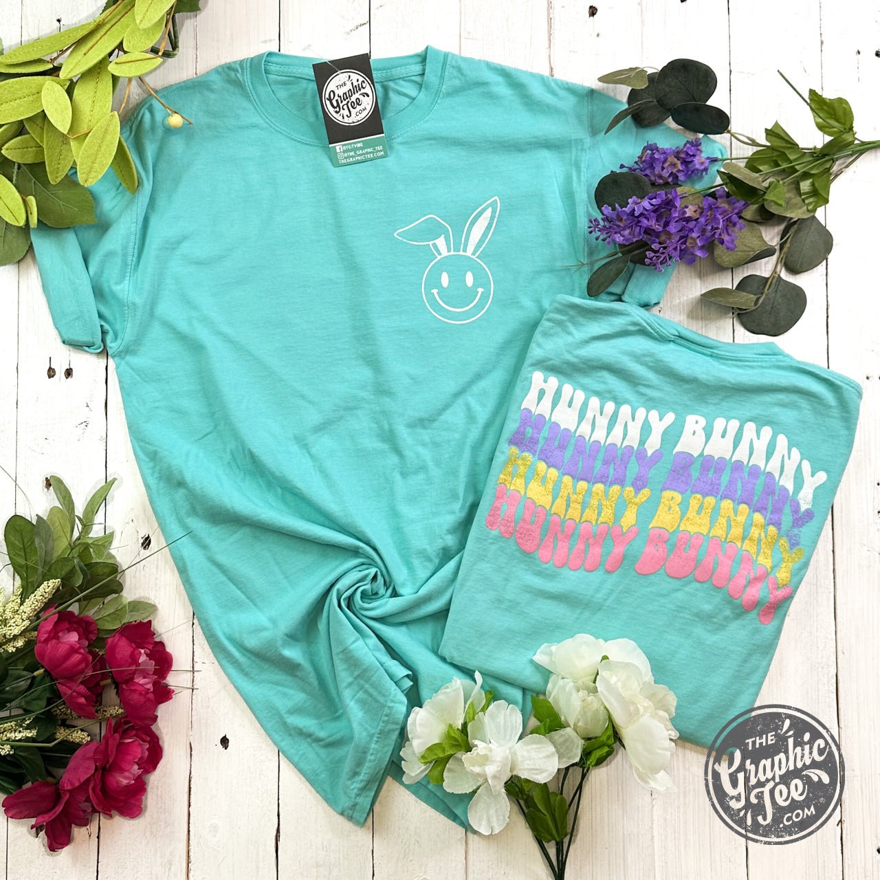 Hunny Bunny pigment-dyed short sleeve graphic tee by The Graphic Tee, showing a colorful bunny design on soft cotton fabric.