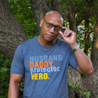 Graphic SS T-shirt for dads featuring a hero protector design, by The Graphic Tee, showcasing a casual, stylish men's graphic tee.