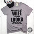 Unisex SS graphic tee from The Graphic Tee with humorous "I Married My Wife For Her Looks" design, casual and comfortable fit.