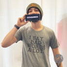 Unisex graphic T-shirt from The Graphic Tee with "I Say Bad Words A Lot" printed on the front, casual and comfortable style.