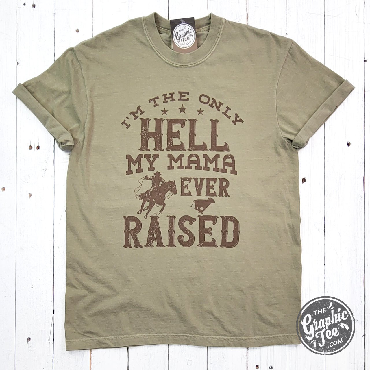Graphic SS T-shirt by The Graphic Tee featuring "I'm The Only Hell My Mama Ever Raised" pigment-dyed design.