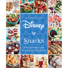 Hardcover copy of "A Taste of Disney: Snacks" cookbook by Insight Editions, featuring colorful Disney snack illustrations.