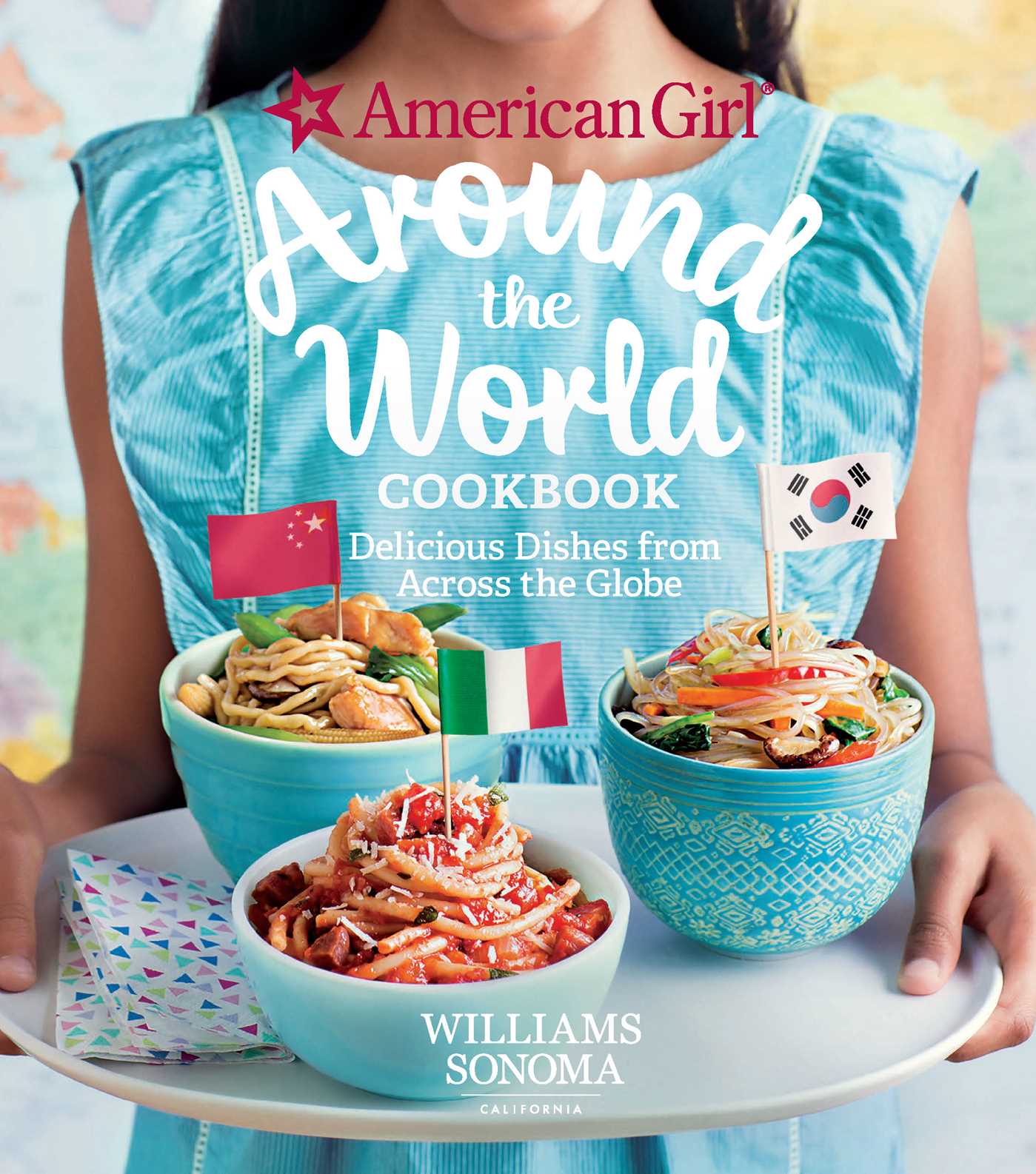 Hardcover American Girl Around the World Cookbook by Insight Editions showing colorful cover with international cuisine images.