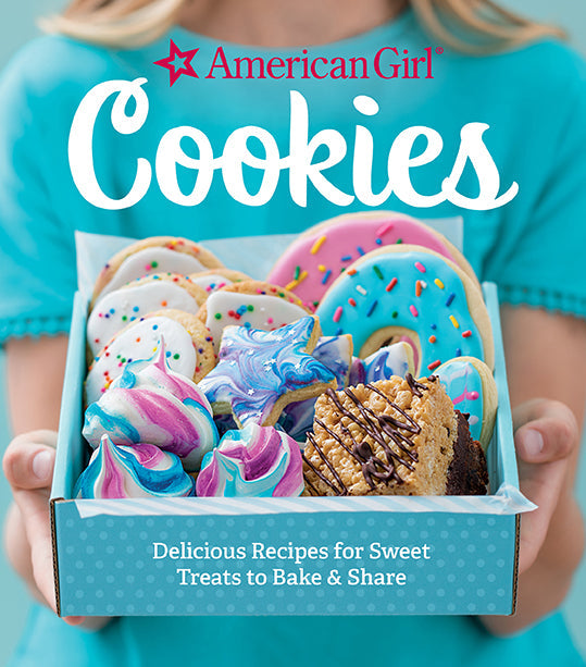 Hardcover book titled American Girl Cookies by Insight Editions featuring colorful cookie illustrations on the cover.