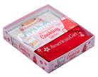 Hardcover American Girl Cooking Gift Set book by Insight Editions with colorful food illustrations and recipe pages.