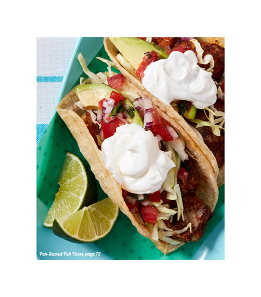 Hardcover American Girl Sweet & Savory Treats Cookbook by Insight Editions showing colorful recipe pages and decorative cover design.
