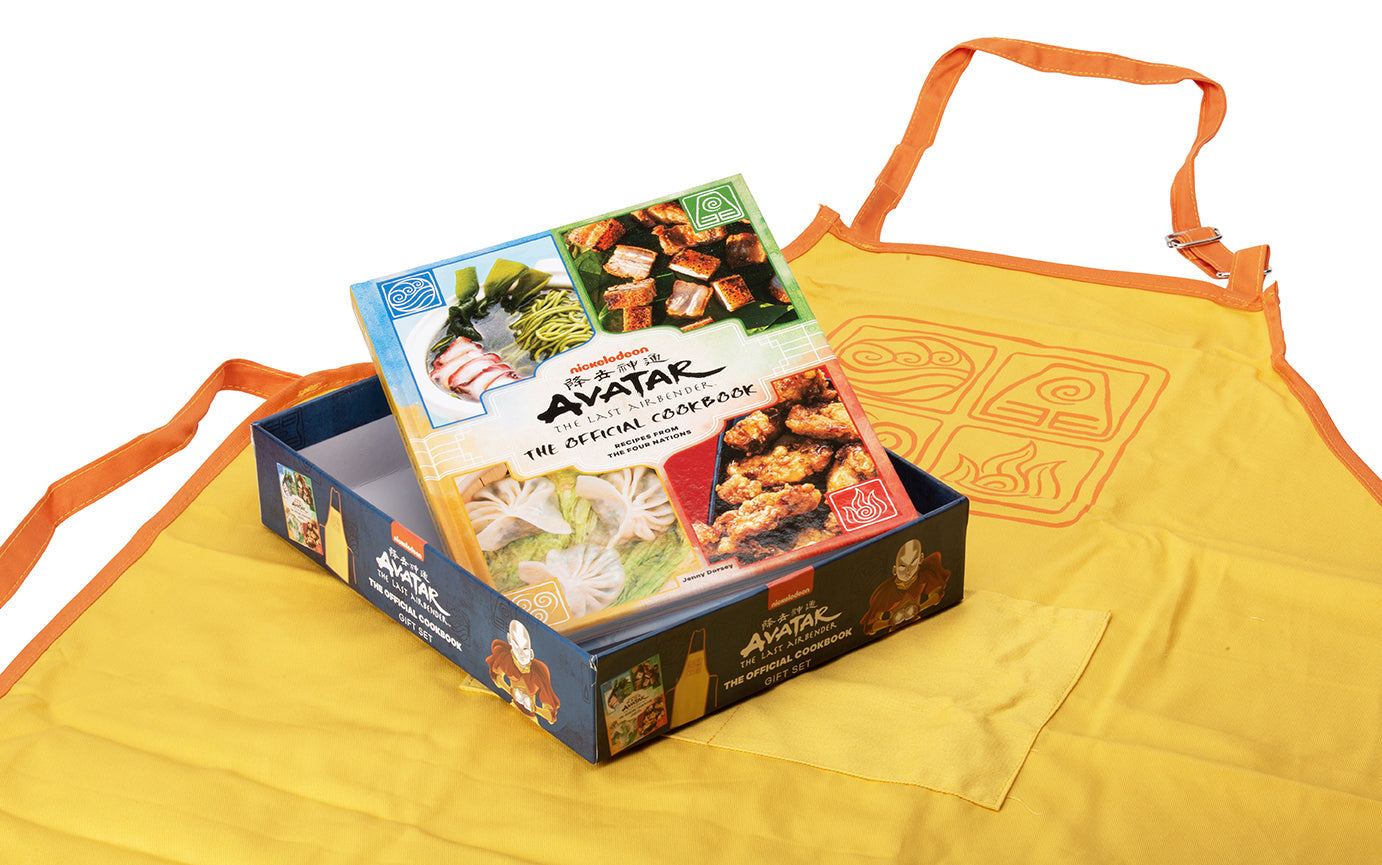 Hardcover Avatar: The Last Airbender Official Cookbook Gift Set by Insight Editions, featuring themed cookware and recipe pages.
