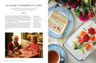 Hardcover copy of "Call the Midwife: The Official Cookbook" by Insight Editions, featuring recipe pages and cover design.
