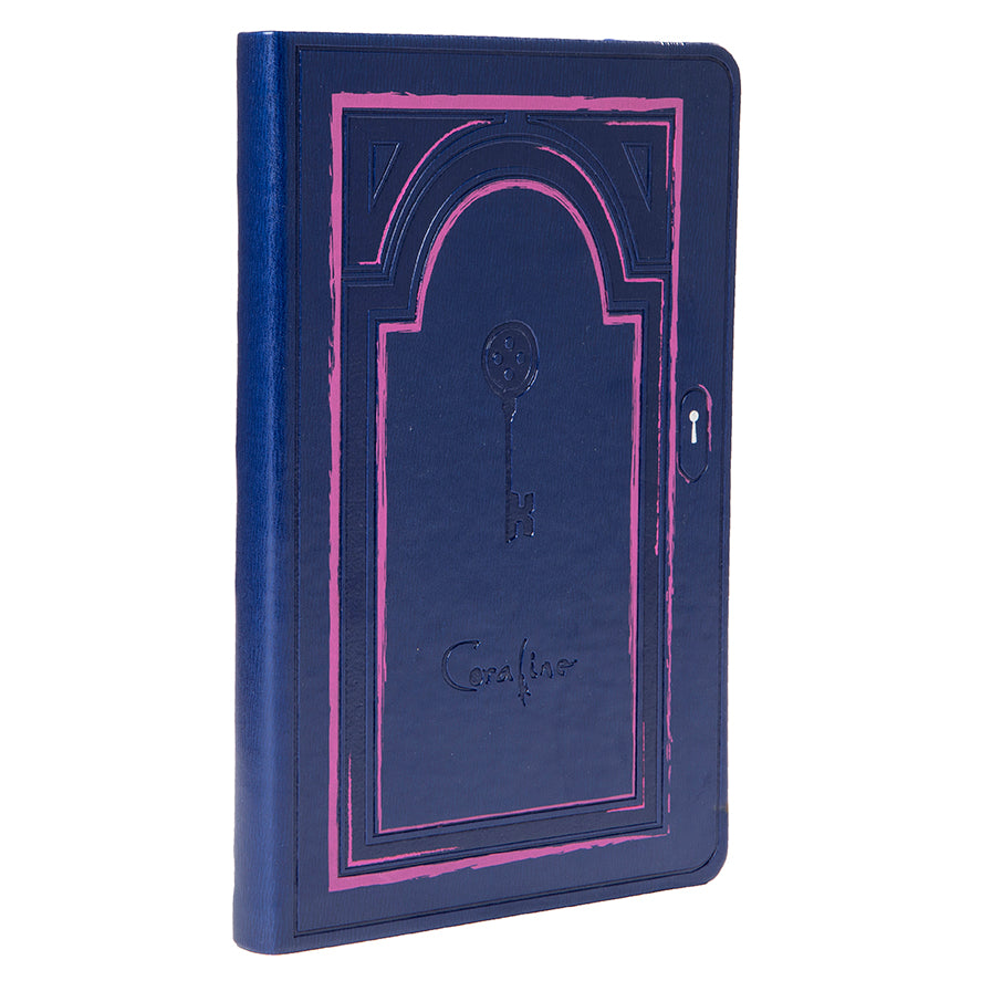Coraline hardcover ruled journal by Insight Editions with a dark, whimsical cover featuring characters from the Coraline story.