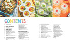 Hardcover book titled "Cooking with Color" by Crayola, published by Insight Editions, featuring colorful illustrations on the cover.