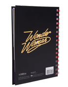 Hardcover Wonder Woman 1984 spiral notebook by Insight Editions featuring DC Comics logo and colorful superhero artwork.