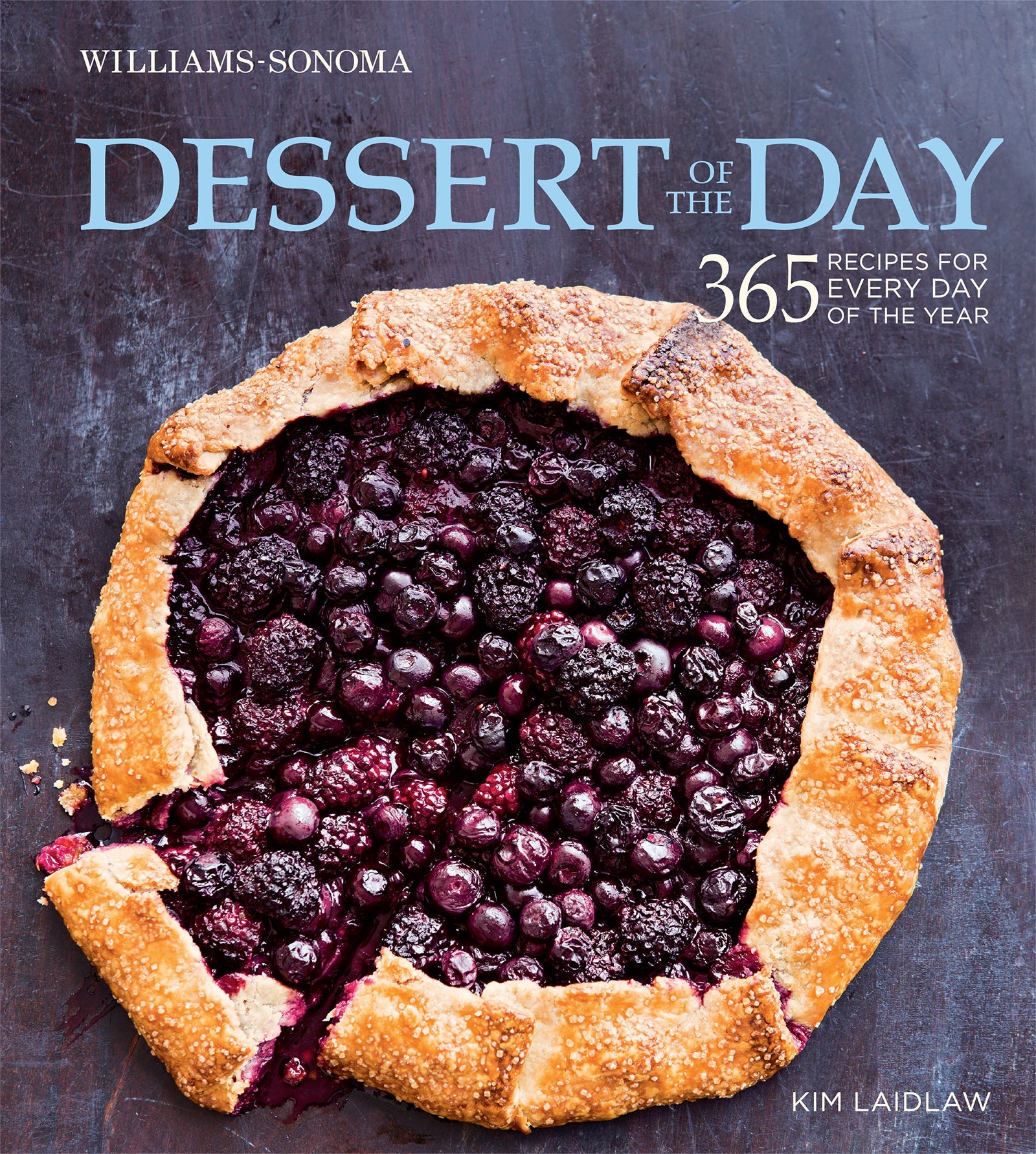 Hardcover book titled "Dessert of the Day" by Insight Editions, featuring a colorful dessert-themed cover design.